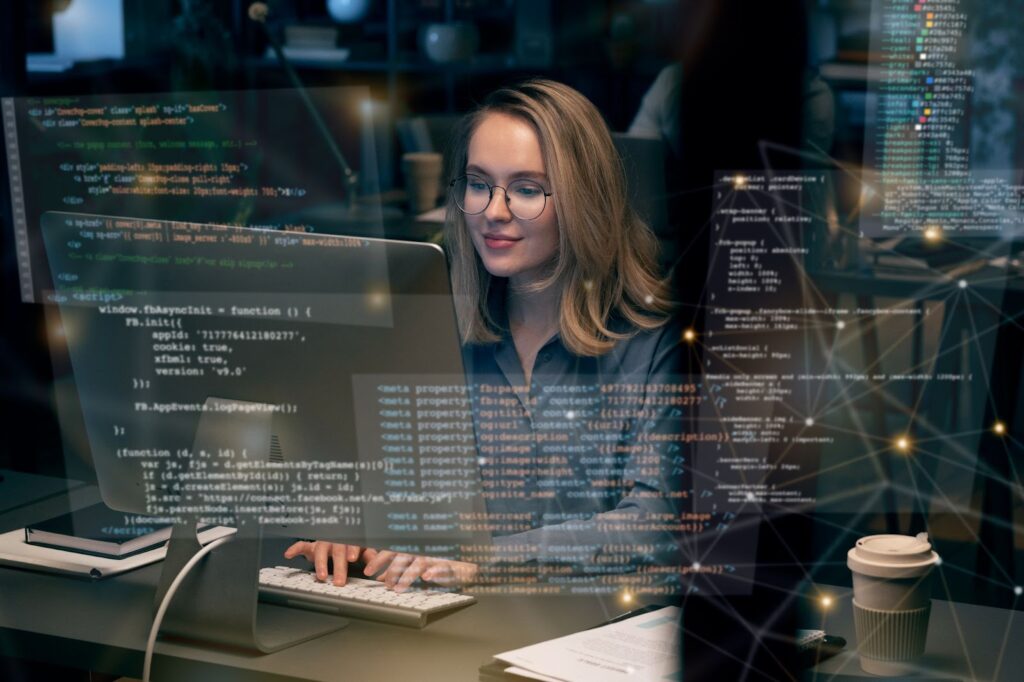 Concept of woman working with code
